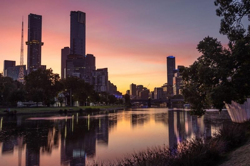 Sunset buildings over water